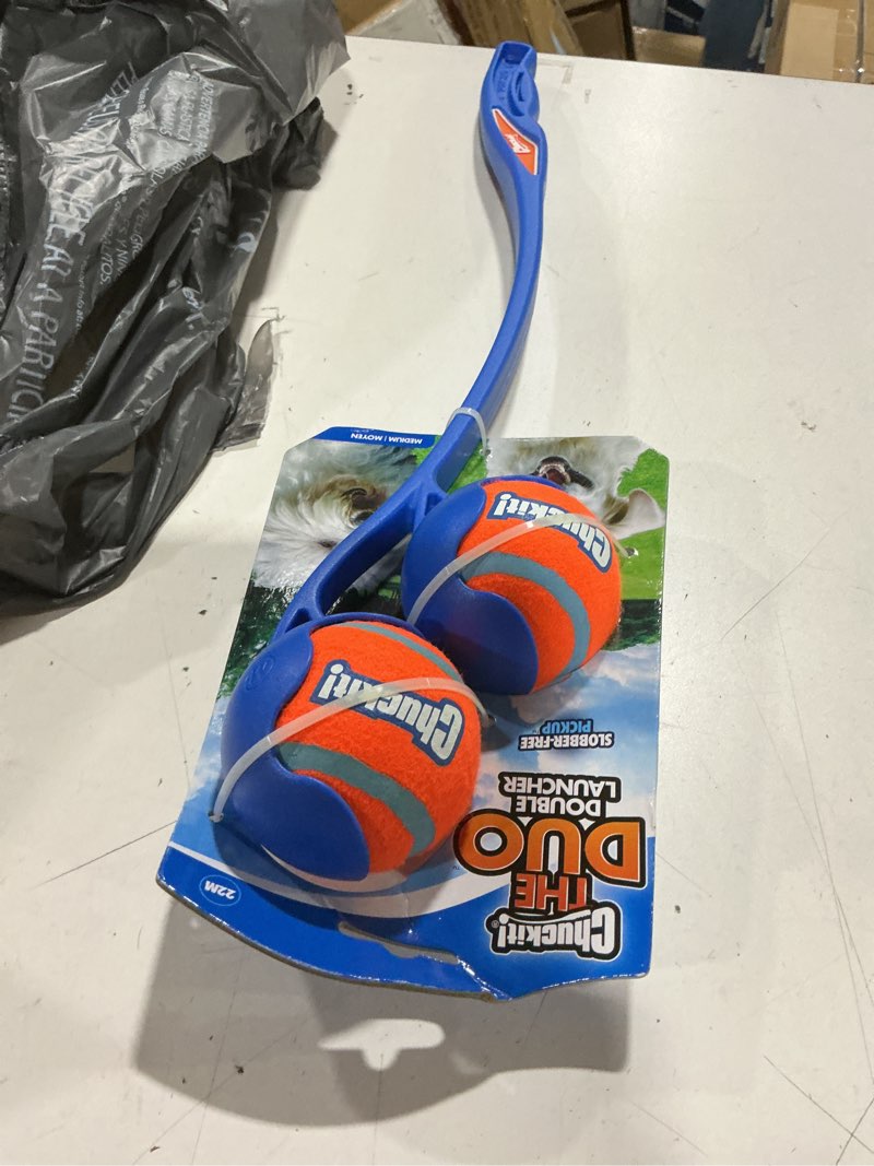 Condition photo showing As Is for chuckit! the duo 22m double launcher dog toy, 22" length, includes 2 medium tennis balls (2.5") size medium for breeds 20-60lbs, multi-dog and pack play