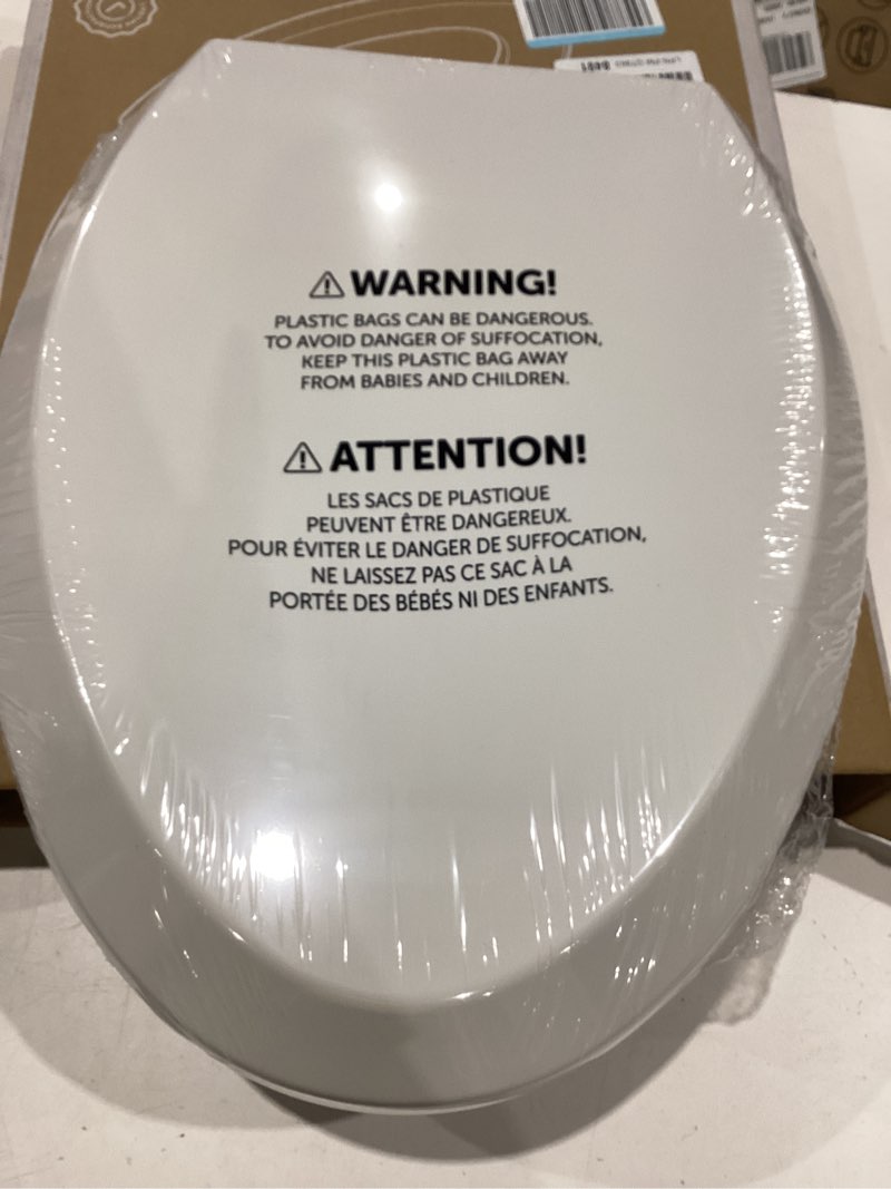 Condition photo showing New/Like New for jool baby quick flip toilet seat with built-in potty & splash guard for toddler training, slow close (elongated) oblong