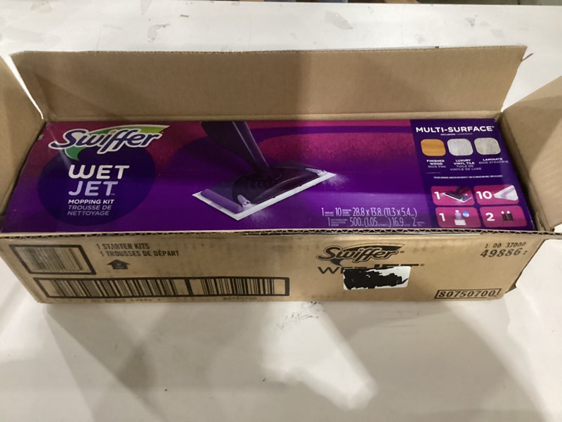Condition photo showing New/Like New for swiffer wetjet hardwood and floor spray mop cleaner starter kit, includes: 1 power mop, 10 pads, cleaning solution, batteries 1 kit cleaner kit