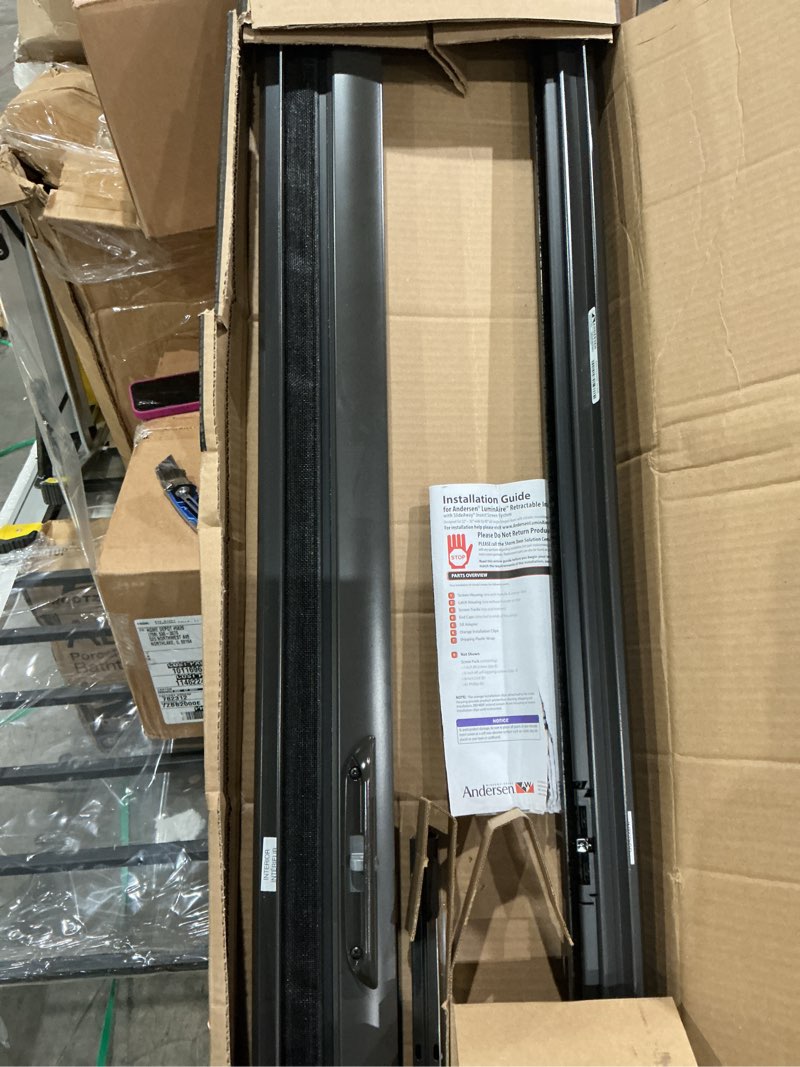 Condition photo showing As Is for 36 in. x 78 in. luminaire bronze for single entry door 32 in.-36 in. universal handed aluminum retractable screen door