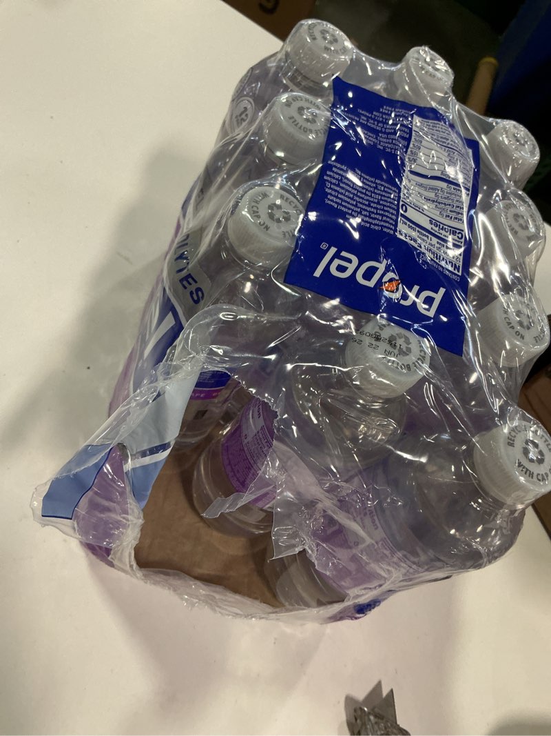 Condition photo showing As Is for Propel, Grape, Zero Calorie Sports Drinking Water with Electrolytes and Vitamins C&E, 16.9 Fl Oz (Pack of 12) ( jun 22/26 )