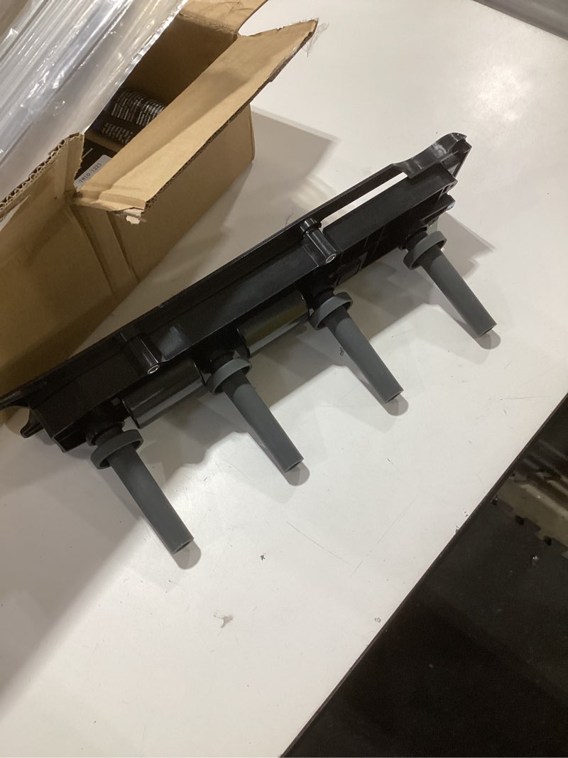 Condition photo showing As Is for ignition coil grey plug, for peugeot
