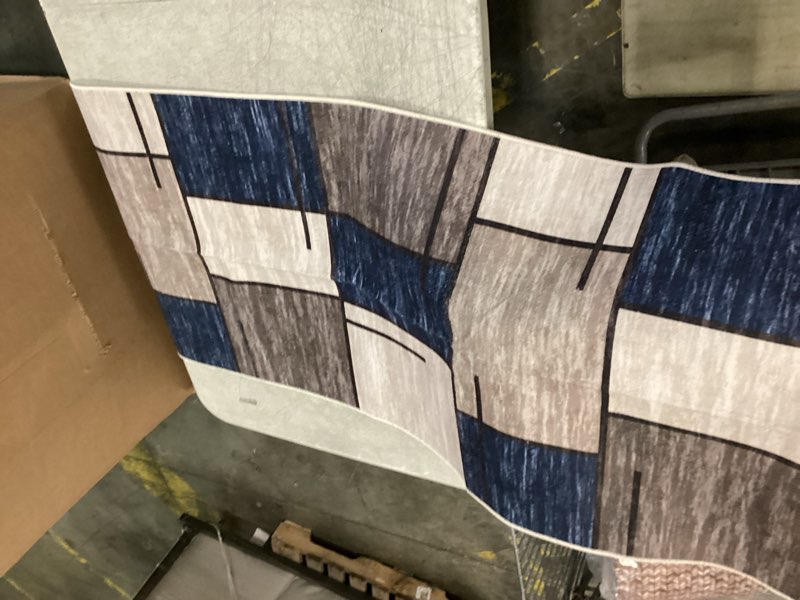 Condition photo showing New/Like New for modern geometric rug washable area rugs for living room soft stain resistant low-pile carpet, 2' x 6' blue
