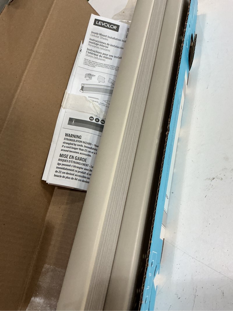 Condition photo showing As Is for levolor 24-in x 72-in sand light filtering cordless cellular shade