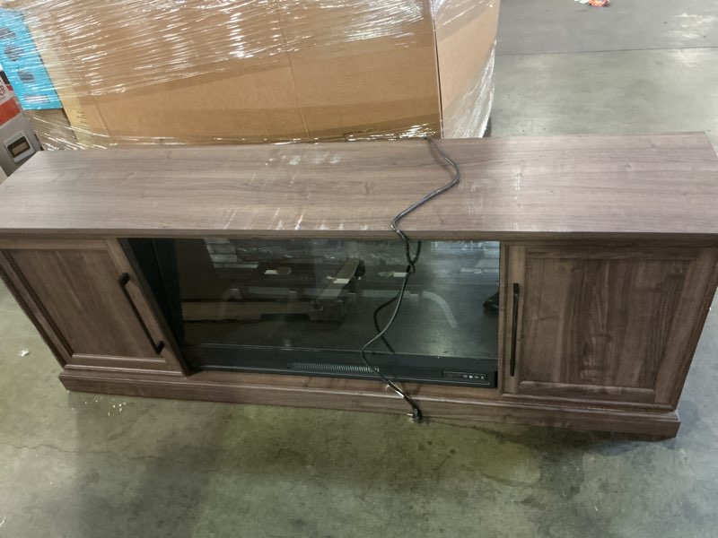 Condition photo showing As Is for allen + roth 72-in W Brown Walnut TV Stand with Infrared quartz Flat Wall Electric Fireplace with