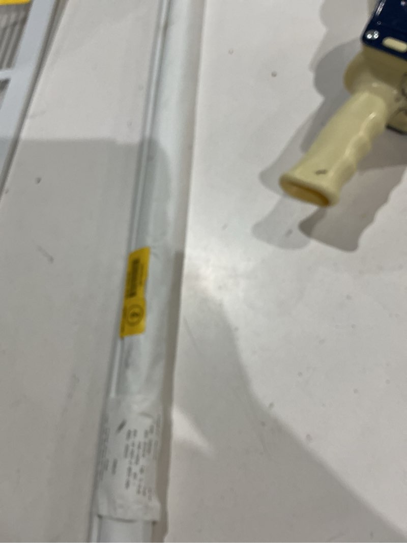 Condition photo showing As Is for levolor trim+go 50-in x 72-in white light filtering cordless roller shade