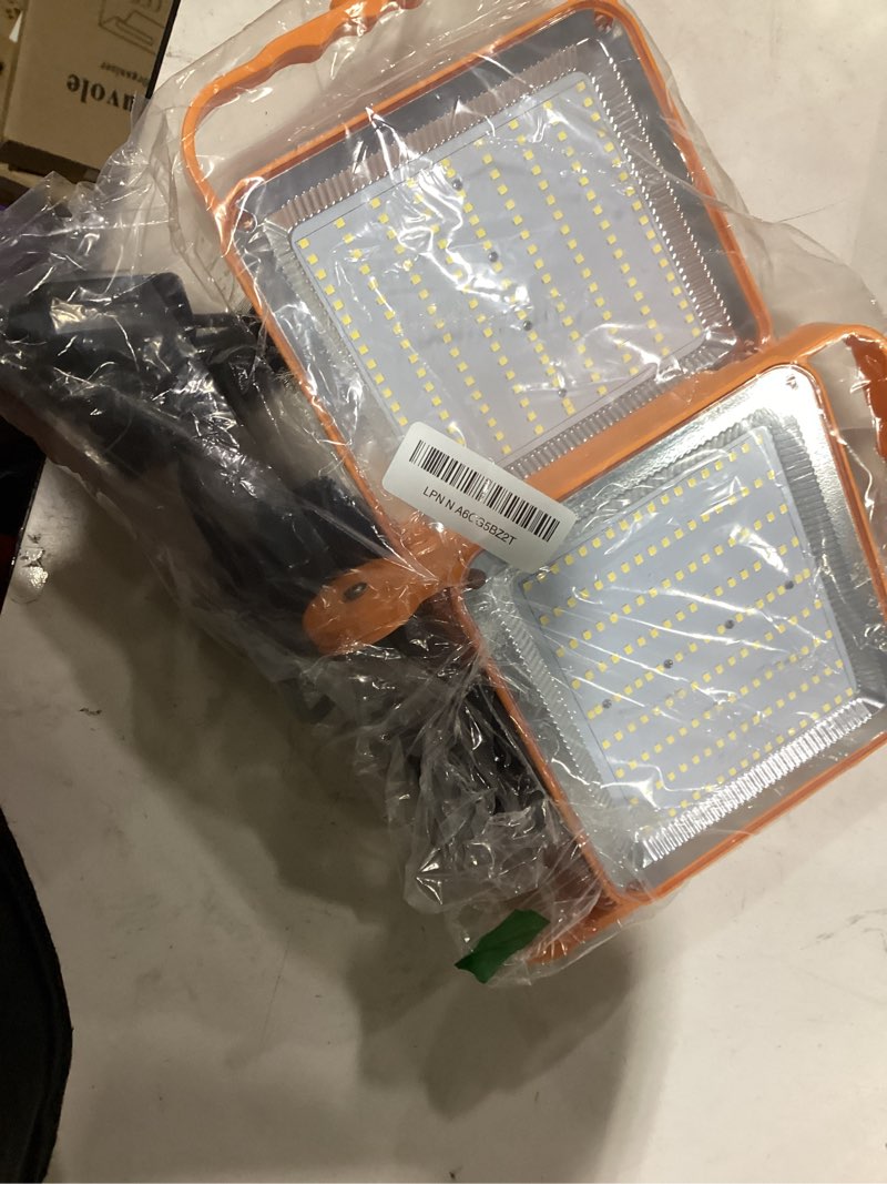 Condition photo showing Good Condition for 2-Pack 50W Super Bright LED Work Light - 8,000LM (500W Equivalent), IP65 Waterproof, 10ft Heavy Duty Cord, 5000K Daylight, Adjustable Flood Lights for Workshop, Garage, Construction Site Orange 50W