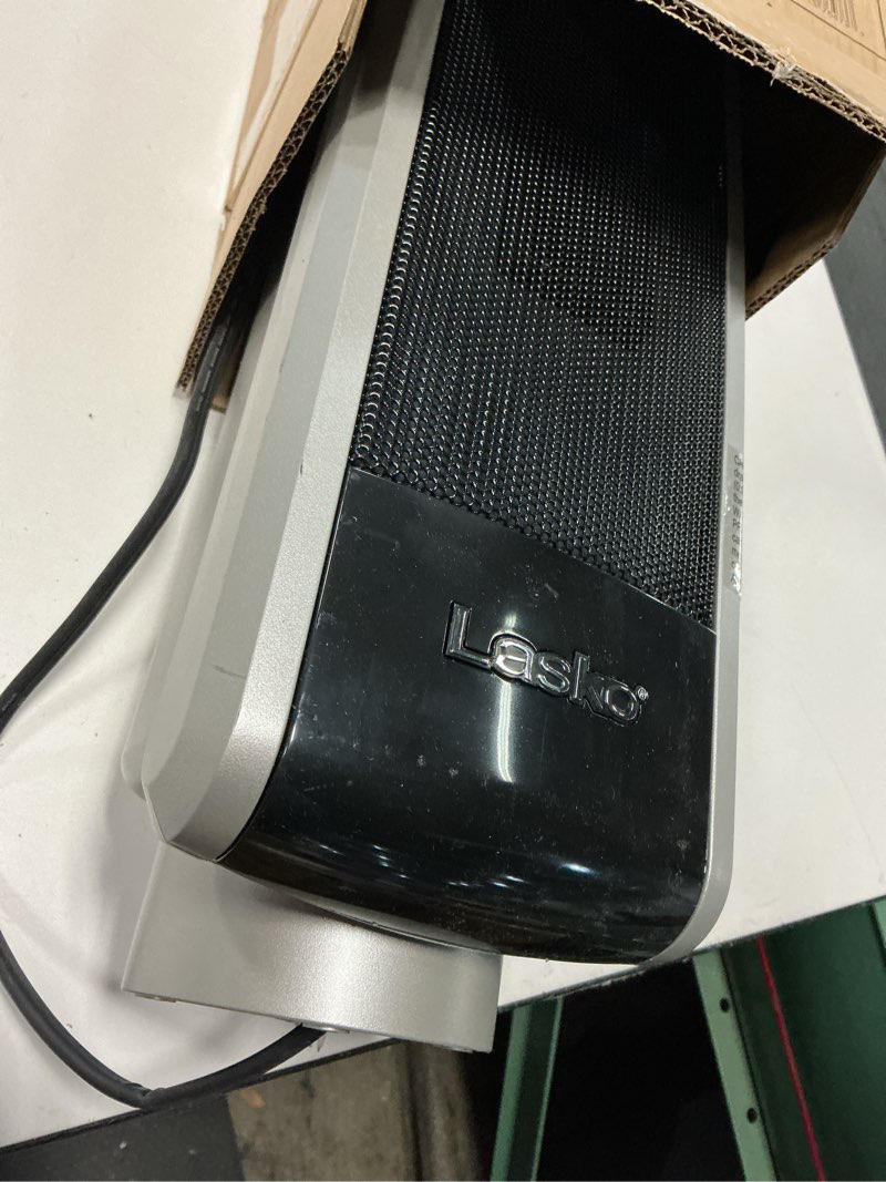 Condition photo showing As Is for Lasko Oscillating Digital Ceramic Tower Heater for Large Rooms, with Adjustable Thermostat, Timer and Remote Control, 29 Inches, 1500W, Black, 5586 Black 5586 Tower Heater space heater