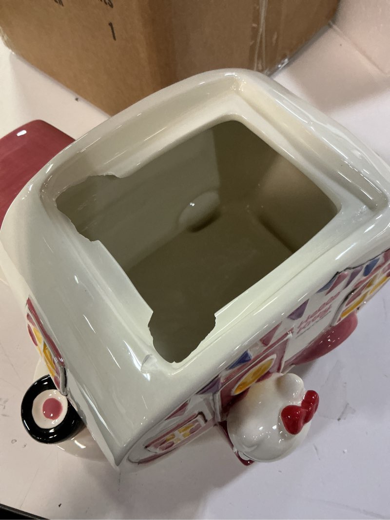 Condition photo showing As Is for blue sky clayworks hello kitty retro camper cookie jar, ceramic, 10" l x 7" w x 8" h, happy camper treat keeper
