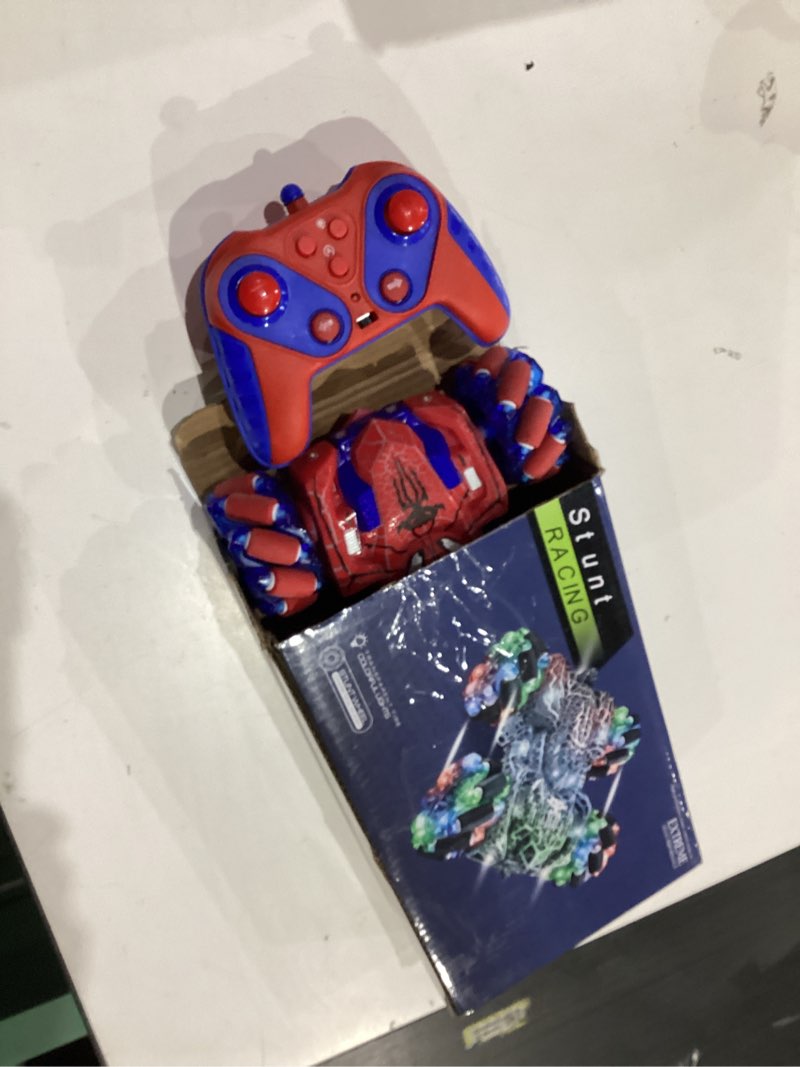 Condition photo showing As Is for spider remote control car with wholebody colorful light, 2.4ghz rc stunt cars toys, double sided off-road 360° rotating,rechargeable 4wd rc drift car spider toys for boys kids 4-6 5-7 8-12