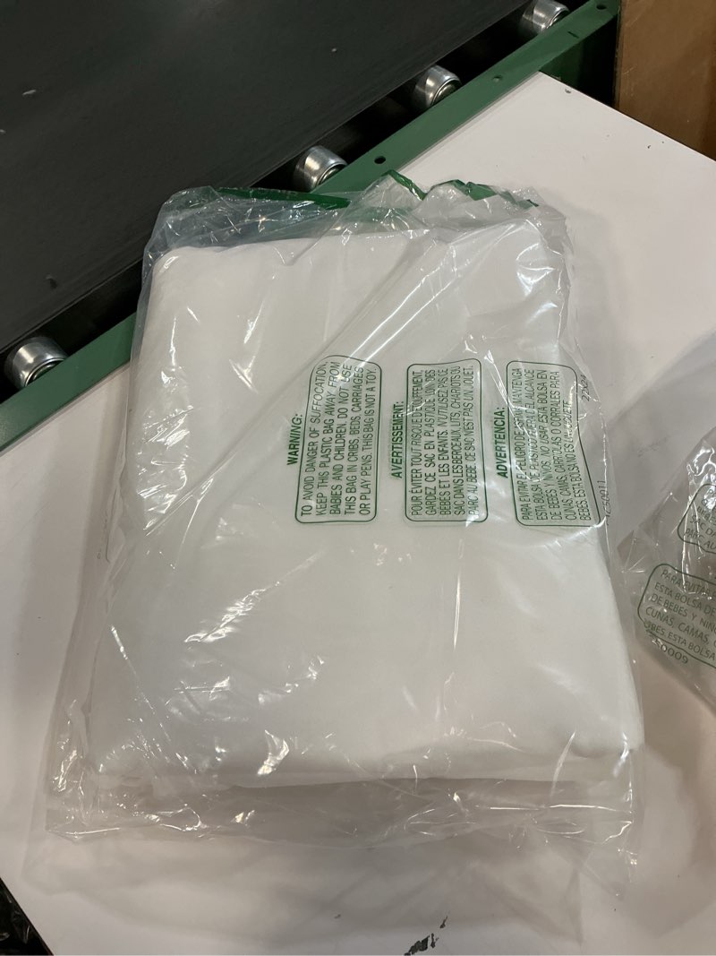 Condition photo showing Good Condition for TOWN & COUNTRY BASICS Cabana Solid Heavyweight Indoor Outdoor Curtains, Light Filtering Opacity with Grommet Top, Water Repellent, 2-Pack Set, 54"x108", Winter White Winter White 54"W x 108"L (Pack of 2)