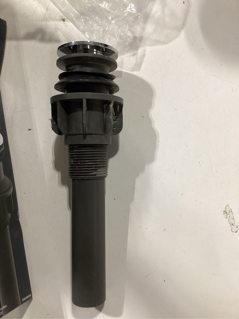 Condition photo showing As Is for kohler 1-1/4 in. d polished chrome plastic pop-up drain