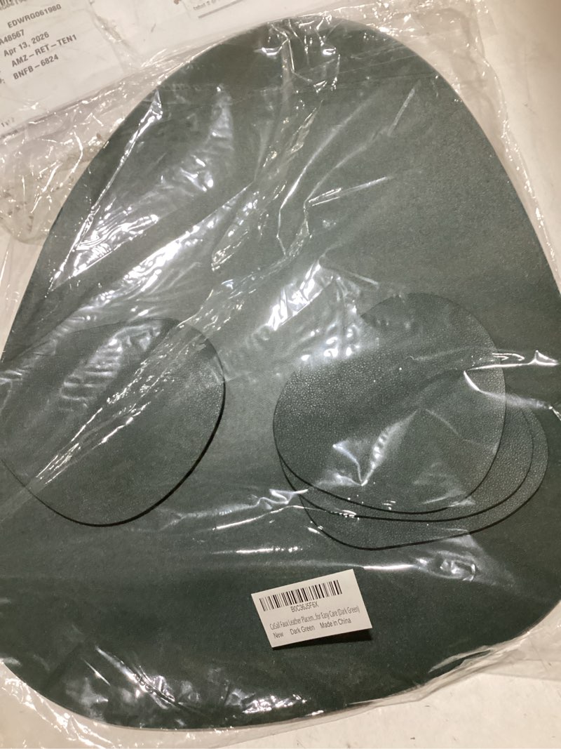 Condition photo showing Good Condition for faux leather placemats and coasters - set of 4 round modern dark green table mats for dining - heat resistant, waterproof & non slip place mat for indoor & outdoor - wipeable for easy care