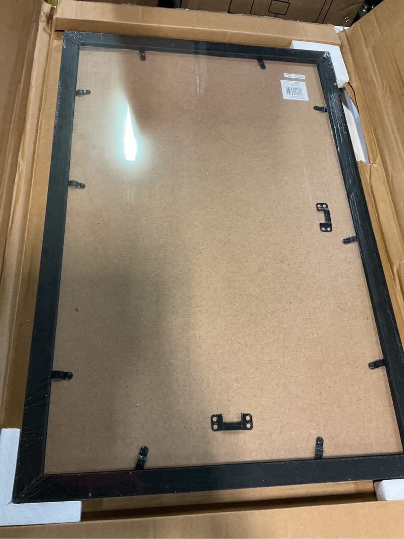 Condition photo showing Good Condition for mcs studio gallery 14x22 poster frame black woodgrain engineered wood, vertical & horizontal wall hanging large picture frame for photos, posters & art prints (1-pack) 1-pack black woodgrain 14x22