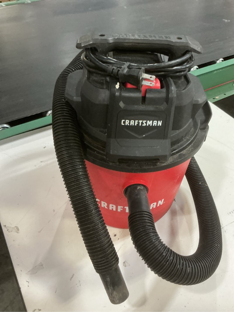 Condition photo showing As Is for craftsman 2.5gal 2 hp wall-mounted wet/dry vac set