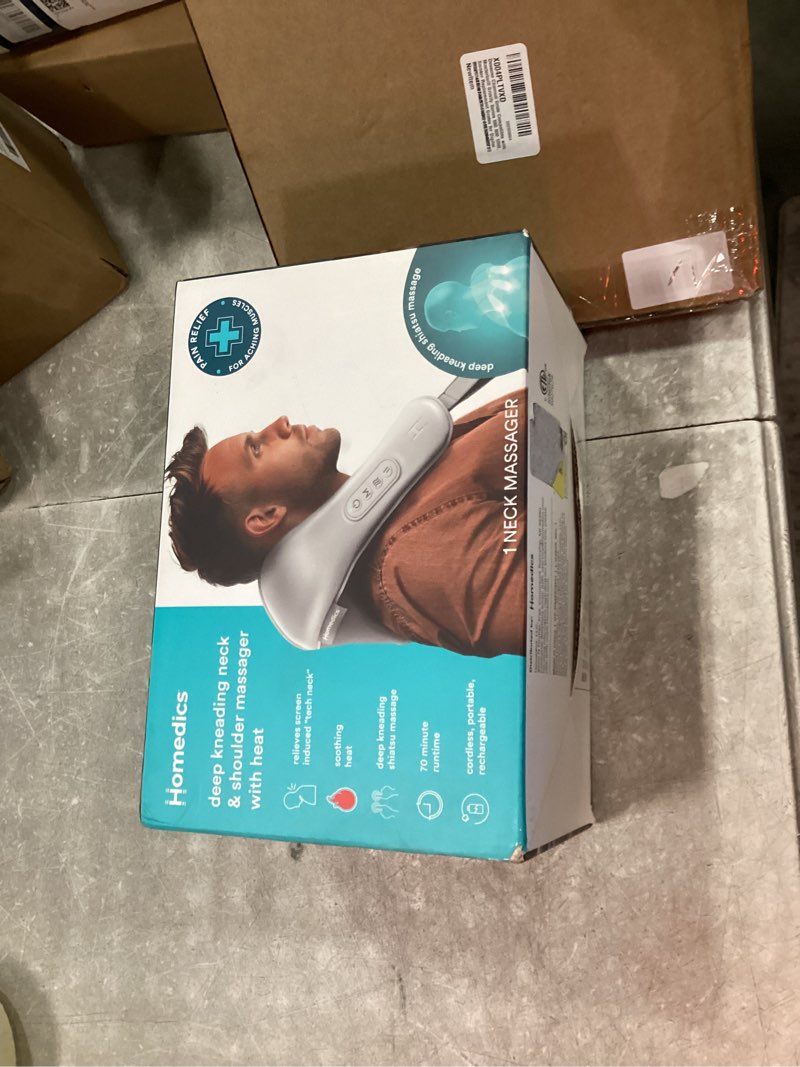 Condition photo showing New/Like New for deep kneading neck & shoulder massager with heat