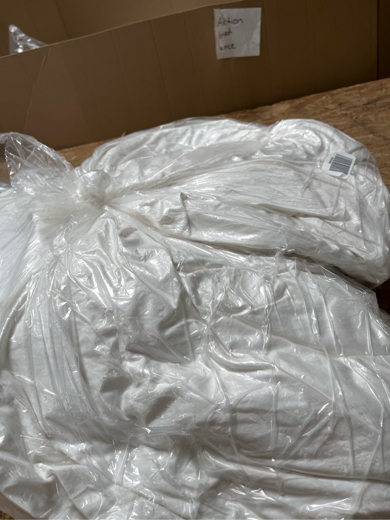 Condition photo showing Good Condition for lightweight premium down comforter, twin, down