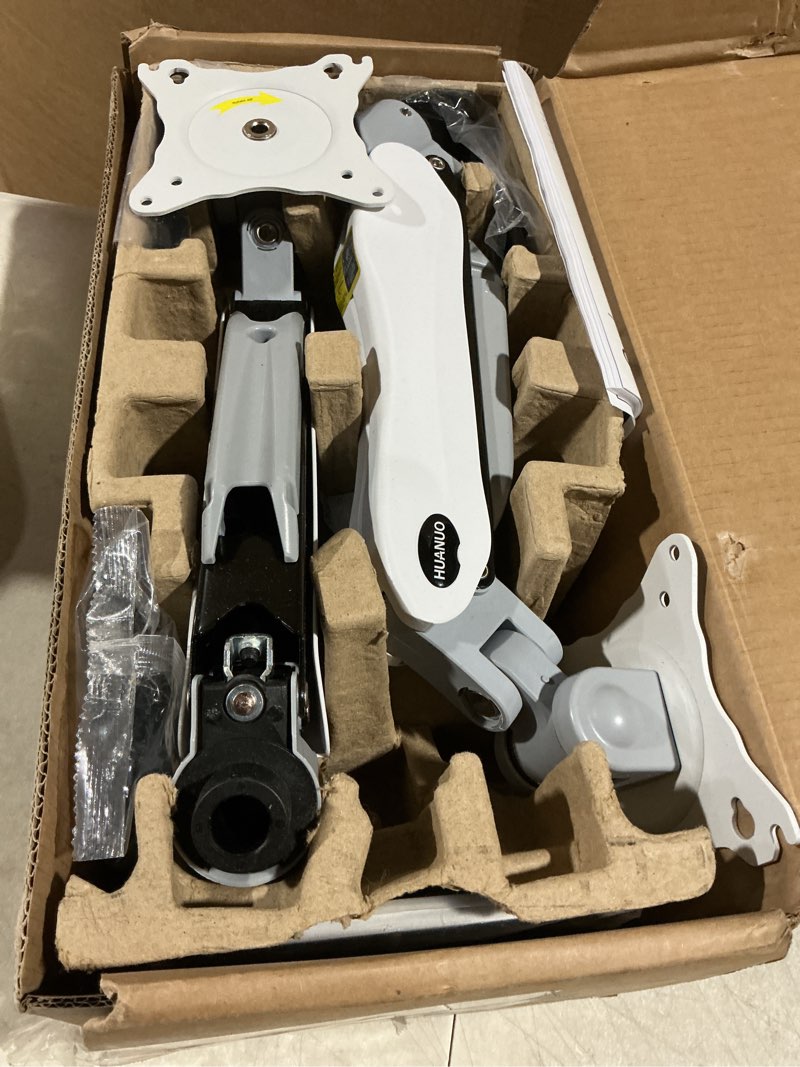 Condition photo showing As Is for HUANUO Dual Monitor Stand - Full Adjustable Monitor Desk Mount Swivel Vesa Bracket with C Clamp, Grommet Mounting Base for 13 to 32 Inch Computer Screens - Each Arm Holds 4.4 to 19.8lbs - White White 13-32 Inch