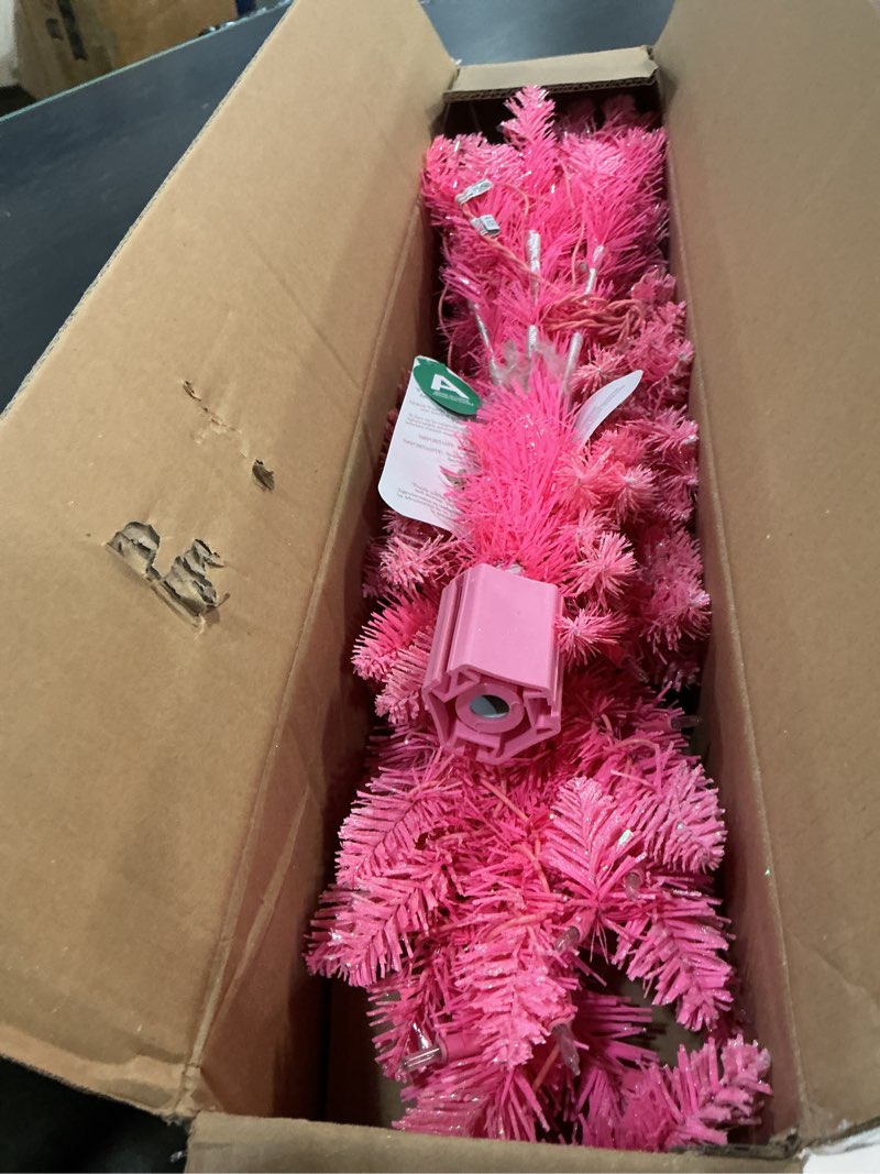 Condition photo showing Good Condition for puleo international 4ft pre-lit fashion pink pine artificial christmas tree with 150 clear lights, 196 realistic dense branch tips, easy setup artificial trees with sturdy stand 4' pink pine with 150 clear lights