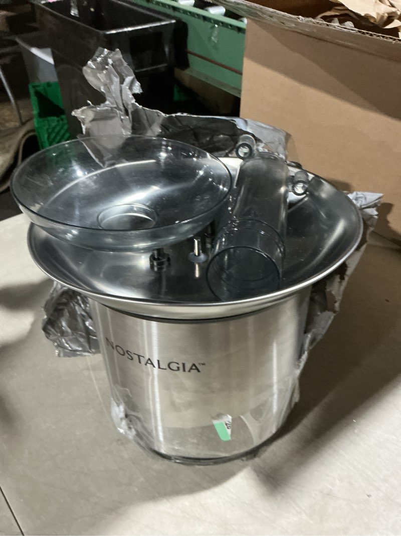 Condition photo showing As Is for nostalgia 24-ounce chocolate fondue fountain, 1.5-pound capacity, easy to assemble 3 tiers, perfect for nacho cheese, bbq sauce, ranch, liqueuers, stainless steel