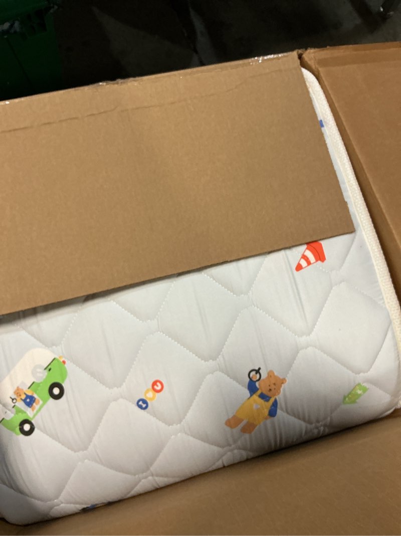Condition photo showing Good Condition for premium baby mattress for crib and toddler bed, 100% knitted fabric, premium fleece surface-hypoallergenic, soft breathable, 5" thick-firm and optimal support, non-toxic crib mattress car bears 52" x 27.6" x 5"