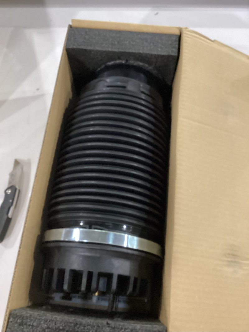 Condition photo showing Good Condition for dorman 949-350 rear air suspension spring compatible with select ram models