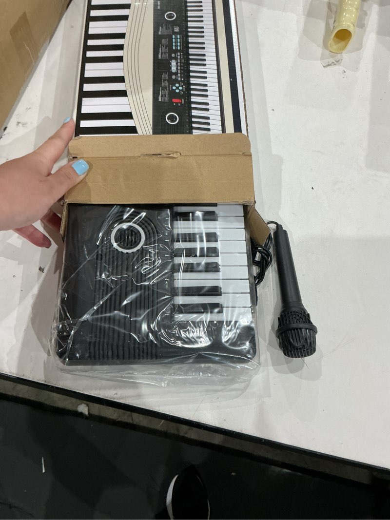 Condition photo showing Good Condition for 61 keys keyboard piano, electronic digital piano with built-in speaker microphone, portable keyboard gift teaching for beginners, electric piano for kids black