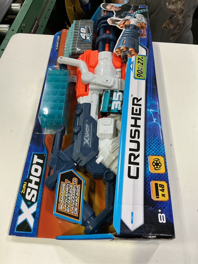 Condition photo showing New/Like New for zuru xshot crusher - shoots 90 ft/27m - slam fire - 48 ammo