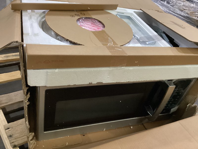 Condition photo showing As Is for ge jvm3160rfss 30" otr microwave, 1.6 cu ft, 1000w, 300 cfm hood vent, led lighting, auto defrost, easy mount install, stainless steel