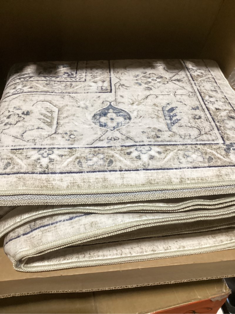 Condition photo showing Good Condition for SAFAVIEH Charleston Collection Area Rug - 9' x 12', Ivory & Light Blue, Oriental Distressed Design, Non-Shedding & Easy Care, Ideal for High Traffic Areas in Living Room, Bedroom (CHL411M) 9' x 12' (Rectangular) Ivory/Light Blue