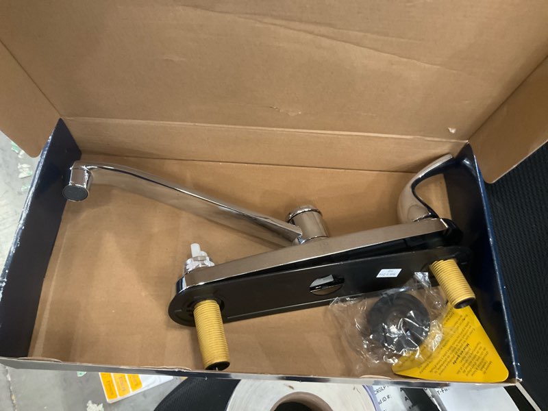 Condition photo showing As Is for project source dover chrome double handle kitchen faucet (deck plate included)