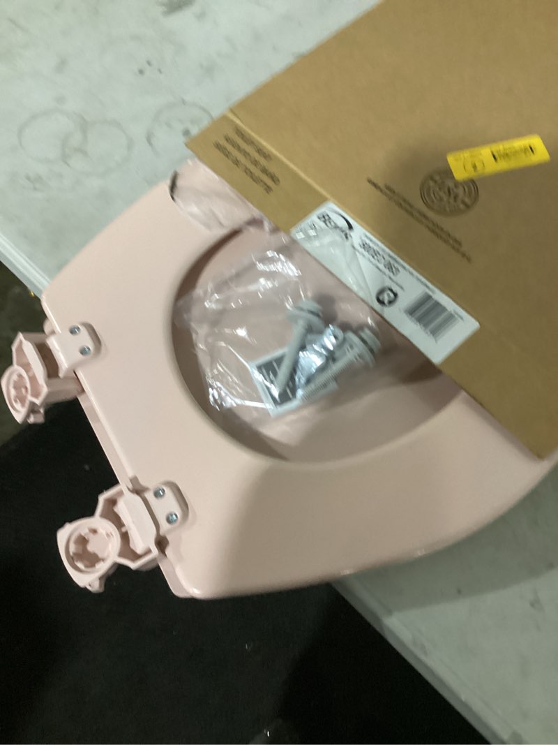 Condition photo showing New/Like New for bemis lift-off venetian pink round toilet seat