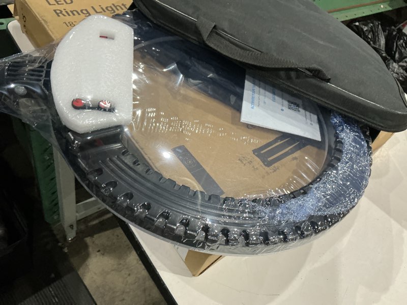 Condition photo showing As Is for eoto light ,led ring light,18”.