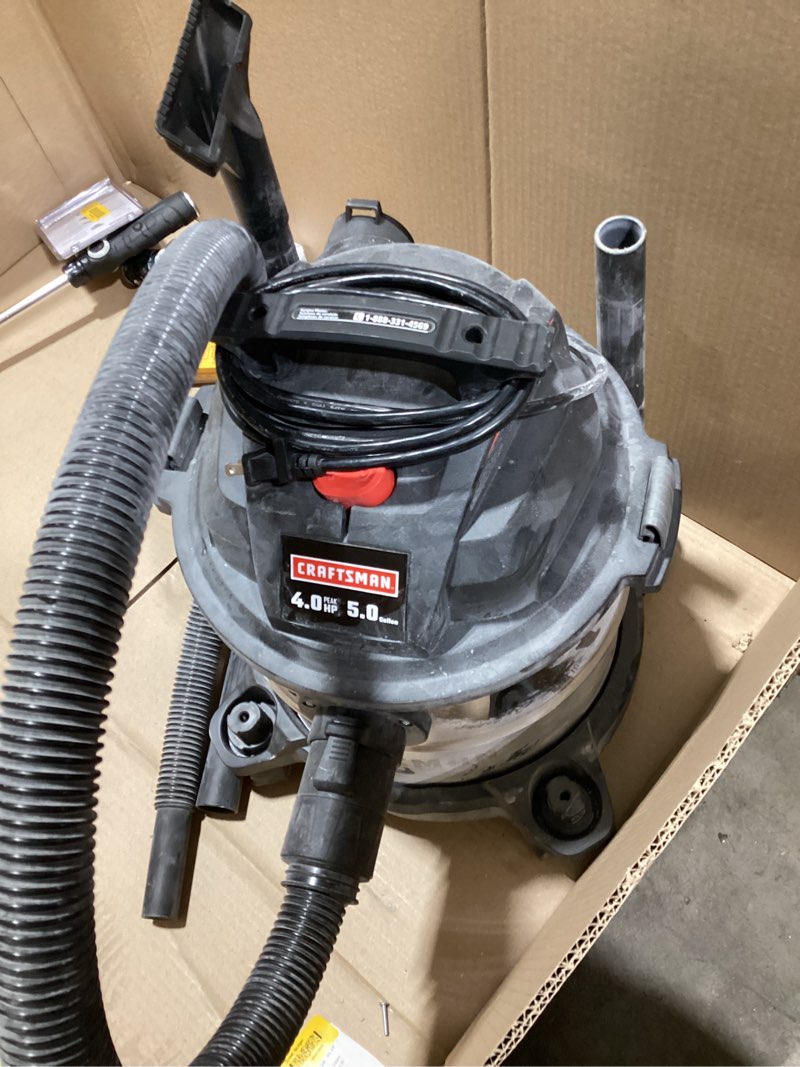Condition photo showing As Is for craftsman 5-gallon 4 hp corded wet/dry shop vacuum with accessories included