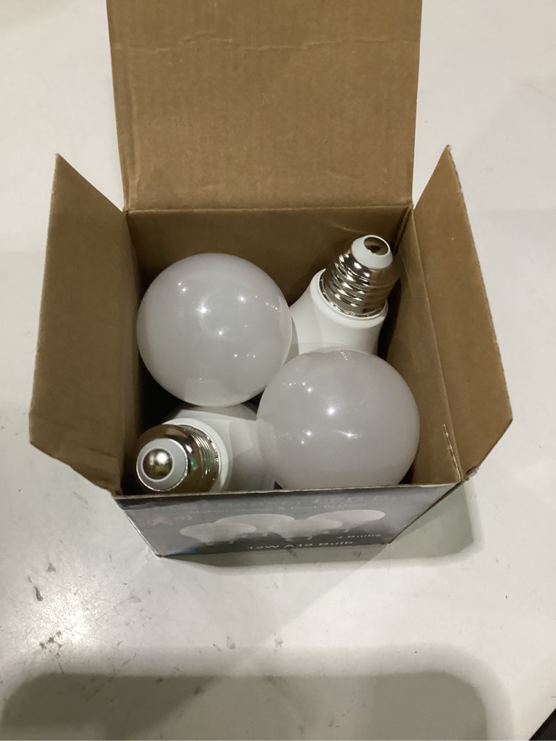 Condition photo showing As Is for 4 pack motion sensor light bulbs,12w (100w equivalent), motion activated dusk to dawn a19 e26 led bulb, glass-penetrating sensor, upward/downward mounting, indoor & outdoor for garage, porch, hallway 2700k a19