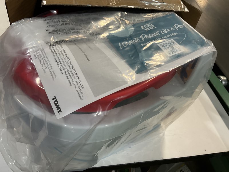 Condition photo showing New/Like New for the first years spidey and his amazing friends potty training toilet - 2-in-1 potty & removable toddler toilet seat attachment with flush sounds - includes anti-splash seat and non-slip grip