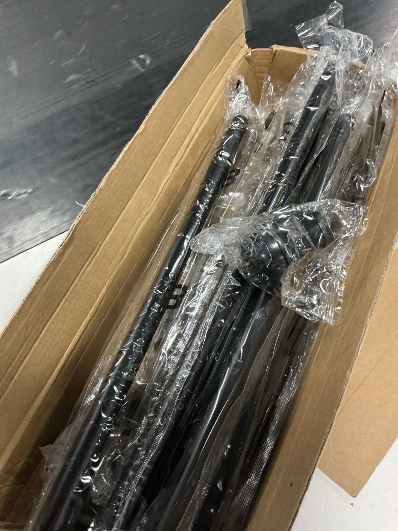 Condition photo showing As Is for ( unknown  ) enjoybasics 2 pack no drill curtain rods for window 48 to 84 inches, 5/8 inch diameter renter friendly drapery rod with adhesive brackets without drilling, adjustable from 27 to 90 inches, black black 27-90\"
