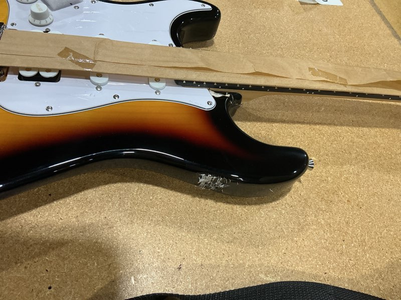 Condition photo showing As Is for donner dst-100s 39 inch full size electric guitar kit solid body sunburst, beginner starter, with amplifier, bag, capo, strap, string, tuner, cable, picks sunburst 39" right handed