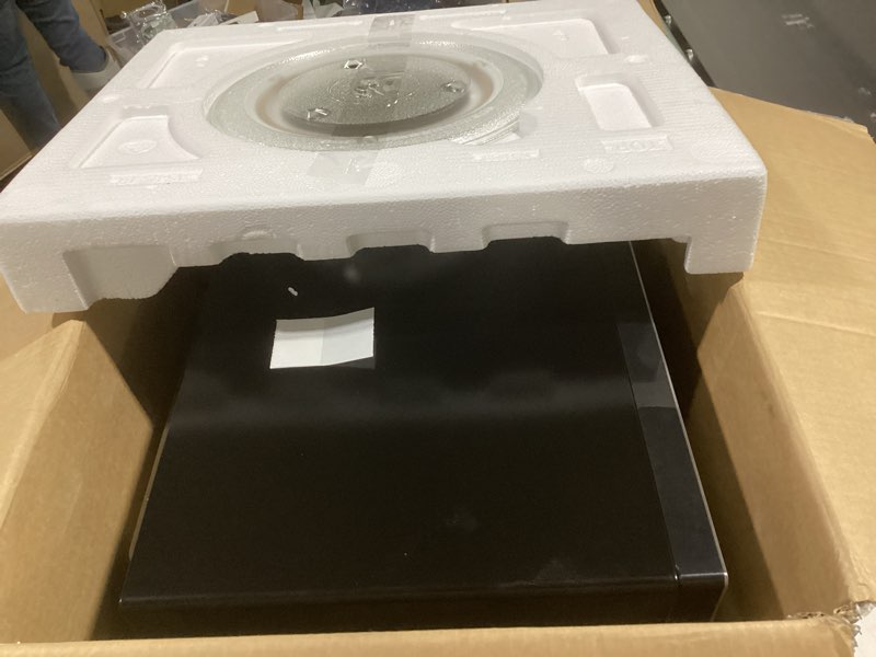Condition photo showing Good Condition for farberware 1.3 cu. ft. countertop microwave oven – 1000 watts power, auto cook settings, defrost, easy clean and child safety lock - stainless 1.3 cu. ft. stainless steel