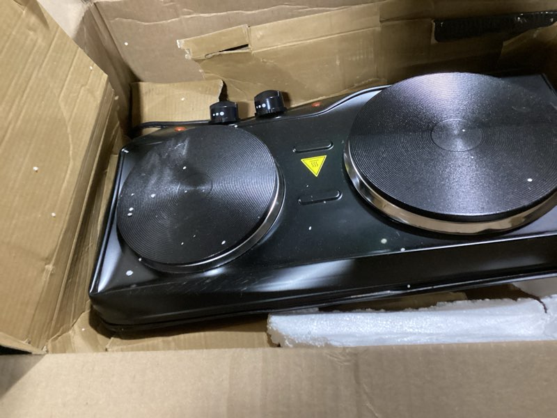 Condition photo showing Good Condition for OVENTE Electric Countertop Double Burner, 1700W Cooktop with 7.25" and 6.10" Cast Iron Hot Plates, Temperature Control, Portable Cooking Stove and Easy to Clean Stainless Steel Base, Black BGS102B BGS102B - Black