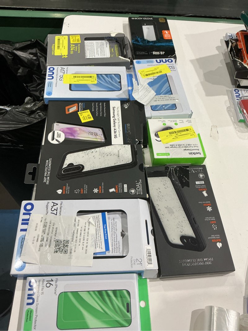 Condition photo showing As Is for assorted cellphone/tablet/laptop case covers & accessories