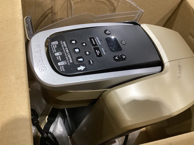 Condition photo showing As Is for keurig k-elite single serve k-cup pod coffee maker, with strength and temperature control, iced coffee capability, 8 to 12oz brew size, programmable, brushed gold