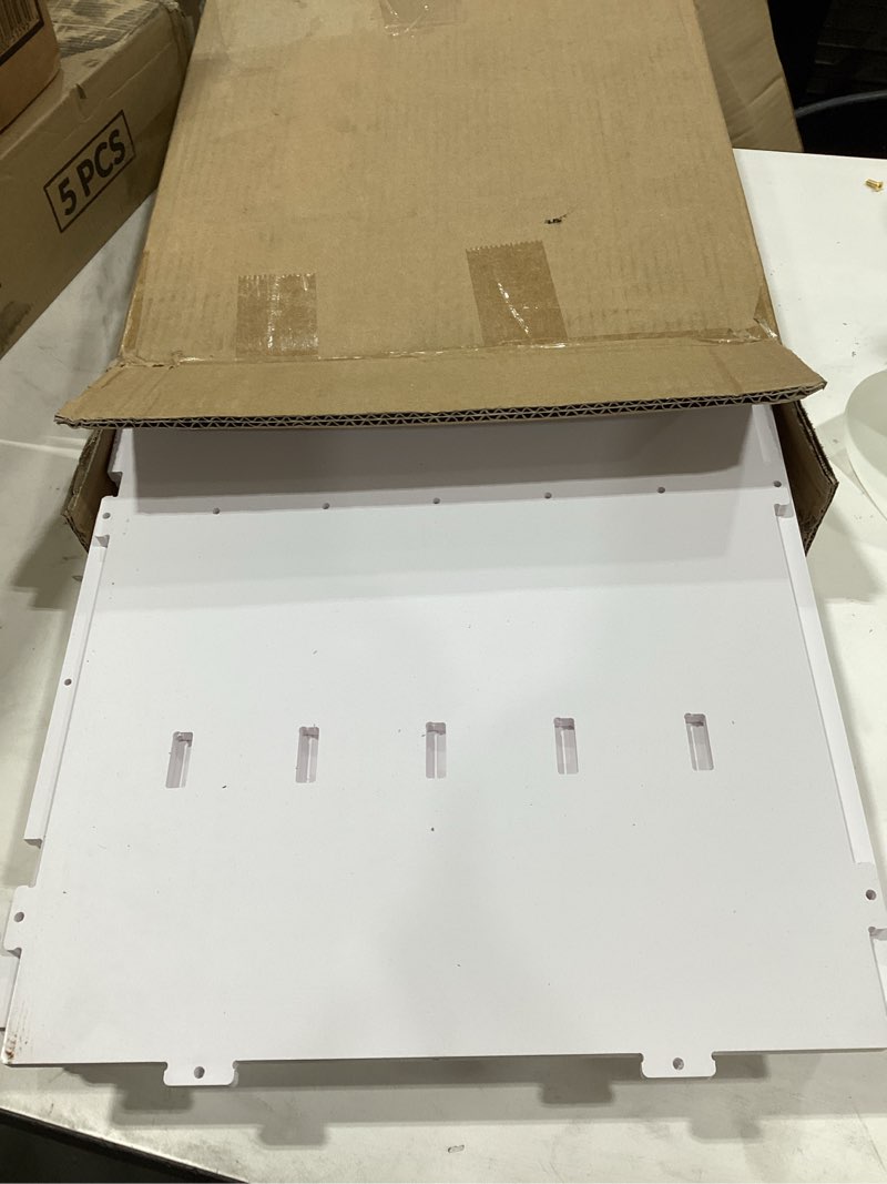 White, interlocking panels typically used in modular storage 