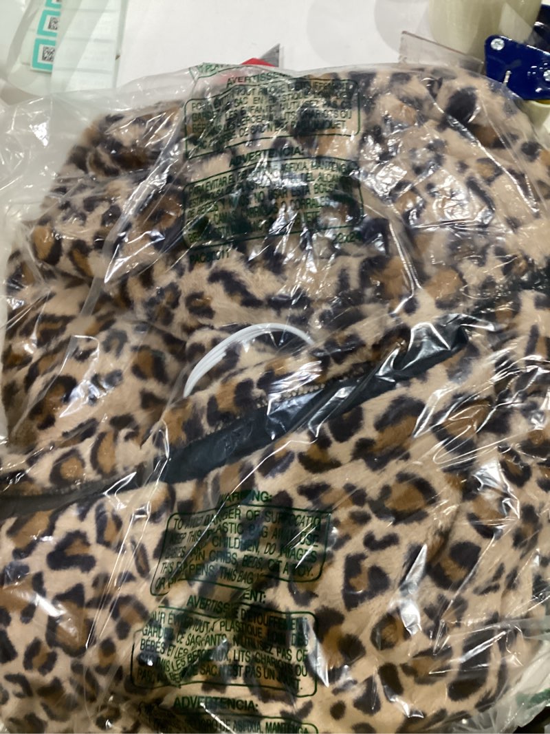 Condition photo showing As Is for beautyrest long brushed faux fur ogee textured design electric blanket, auto shut off, virtually zero emf, multi heat setting, ul certified, machine washable, leopard throw 50x60 leopard 50x60"