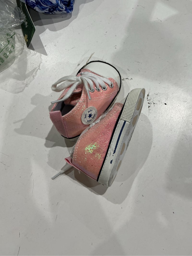 Condition photo showing As Is for soft sole baby sneakers with comfortable canvas design