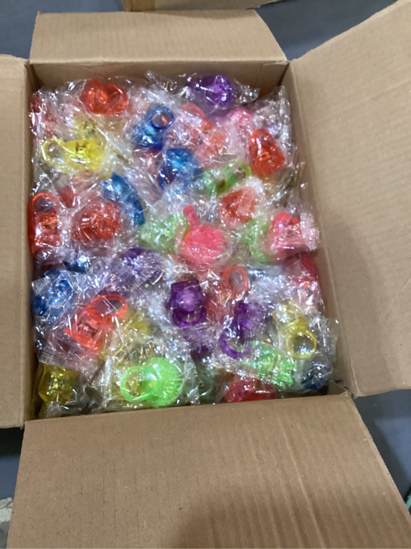 Condition photo showing New/Like New for olupp party favors 100 pcs light up rings, glow in the dark party supplies, 6 style flashing glow in the dark rings for adults & kids, led ring for birthday, concert, raves, halloween, christmas