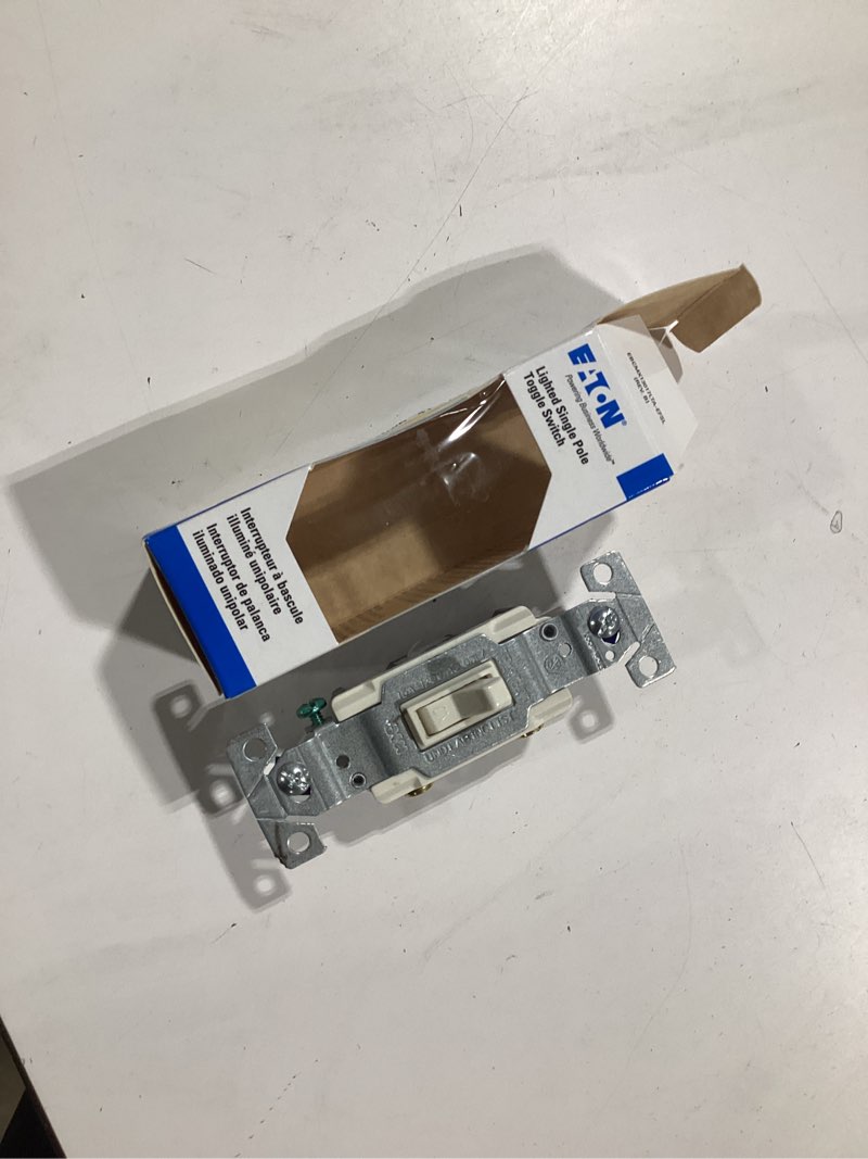 Condition photo showing Good Condition for eaton 15-amp single-pole illuminated toggle light switch, light almond