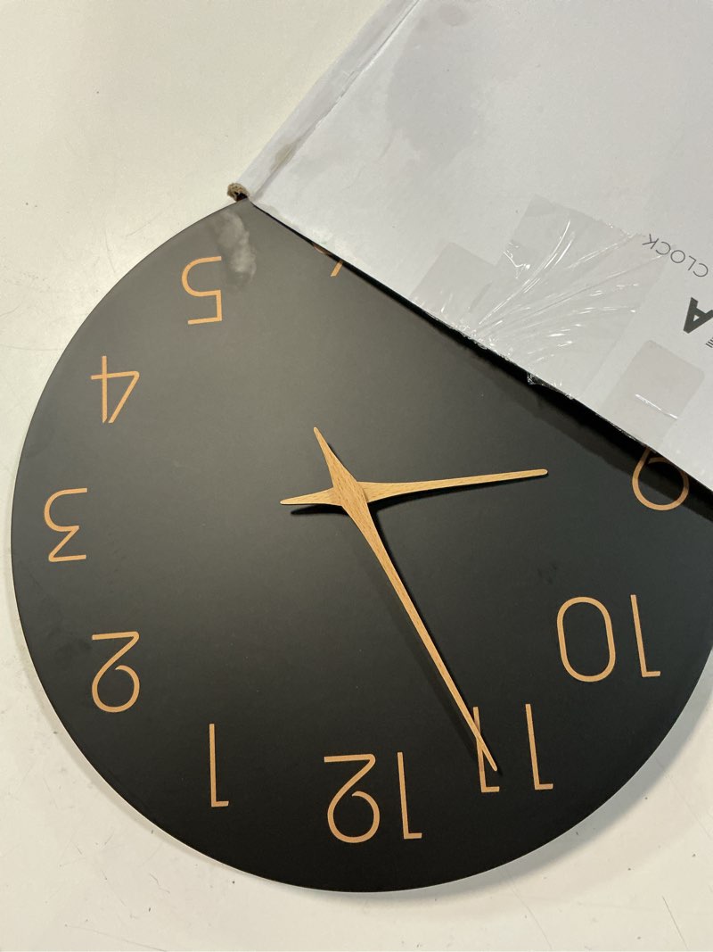 Condition photo showing As Is for mosewa wall clock 14 inch black battery operated silent non ticking simple minimalist rose gold numbers decorative for bedroom living room kitchen home office 14 inch b_black