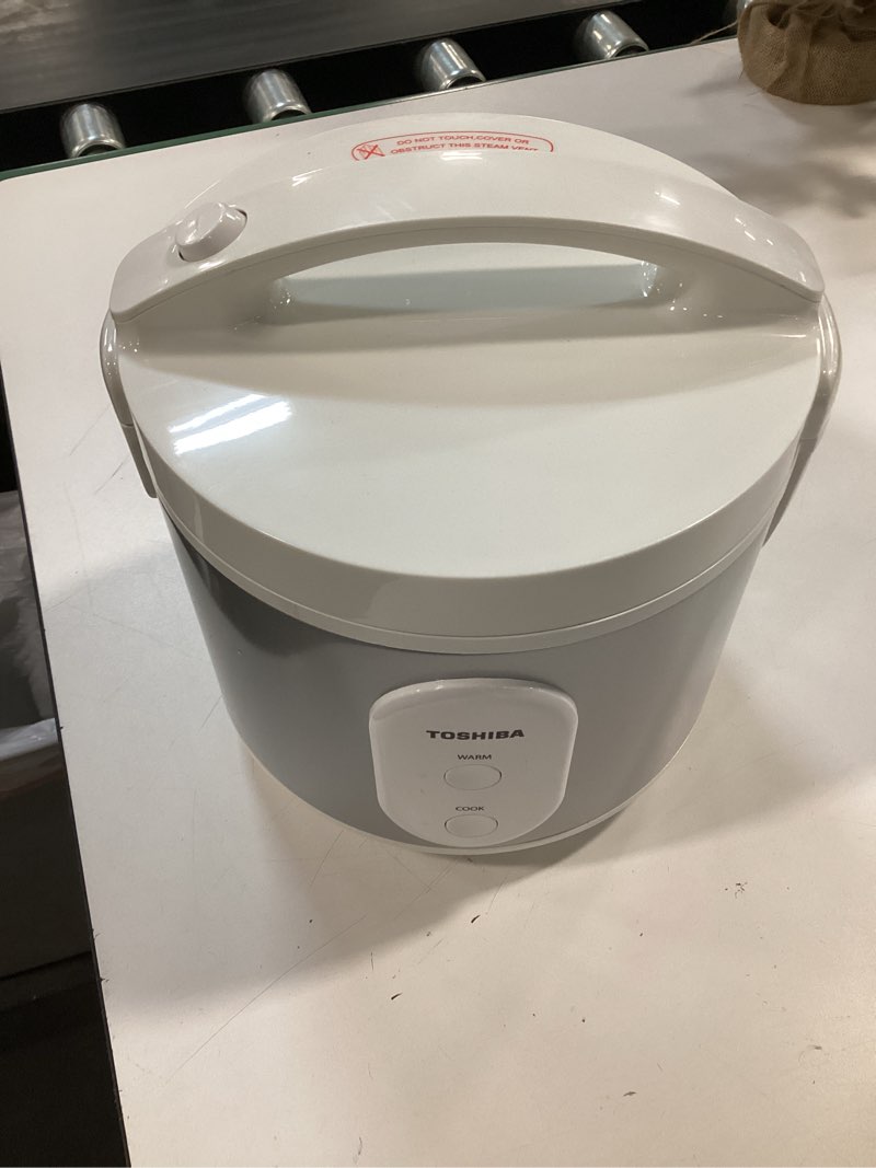 Condition photo showing As Is for TOSHIBA Rice Cooker & Steamer Simple 5.5 Cup(Uncooked) with Steaming Basket, Removable Non-Stick Inner Pot & Inner Lid, for Soups, Stews, Grains&Oatmeal, One Touch&Keep Warm Function, Silvery White Simple_5.5 Cups