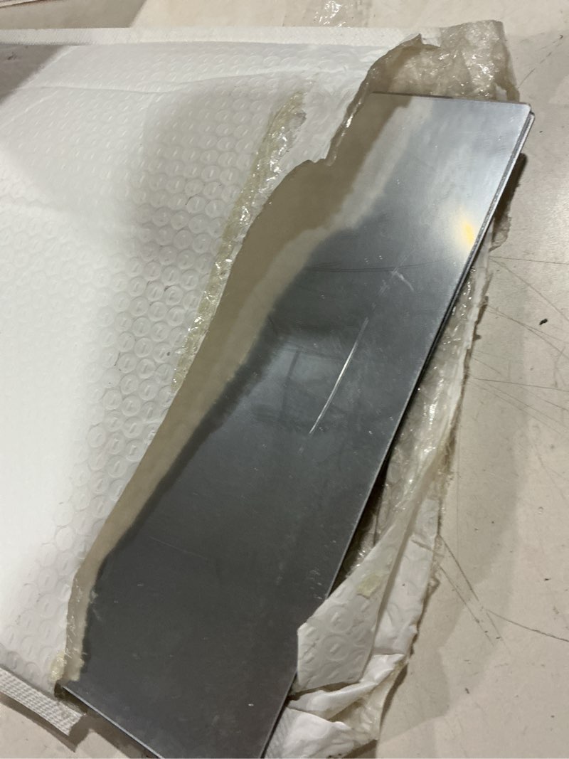 Condition photo showing As Is for zhangxinqi 4 pack acrylic mirrors for wall,12 x 16 inch self adhesive frameless small mirror tiles,